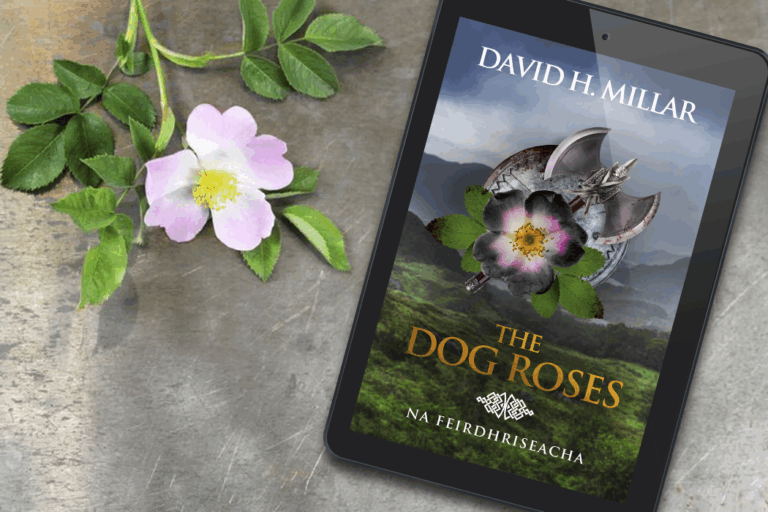 "The Dog Roses" by David H. Millar displayed on an e-reader, surrounded by a pink dog rose and green leaves on a textured surface.